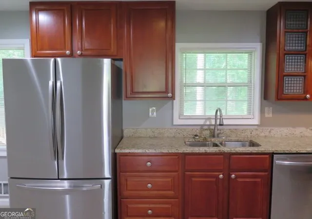Photo 3 of Single family home for sale at 2455 Thornton Dr, Atlanta, GA 30349 | MLS# 10839803 | Listing updated on 2026-09-11