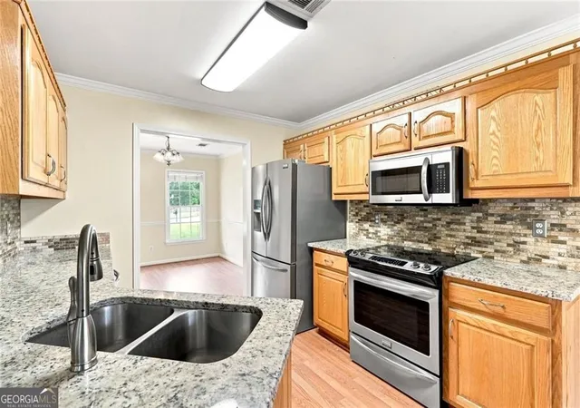 Photo 3 of Single family home for sale at 2232 Woodbriar Dr, Buford, GA 30518 | MLS# 10839728 | Listing updated on 2026-09-18