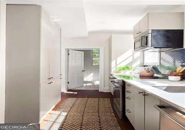 Listing Photo 1 - Condo for sale in building located at 229 Ponce De Leon Ave Ne, Atlanta, GA 30308 - Unit #5