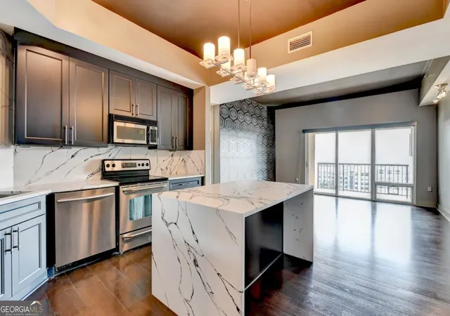 Photo 4 of Condo for sale at 4561 Olde Perimeter Way #UNIT 910, Atlanta, GA 30346 | MLS# 10846565 | Listing updated on 2026-10-13
