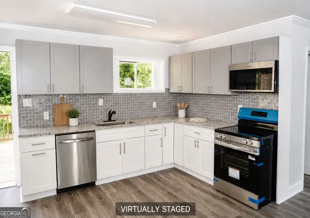 Photo 2 of Single family home for sale at 2911 Macon Dr Sw, Atlanta, GA 30354 | MLS# 10823116 | Listing updated on 2026-09-07