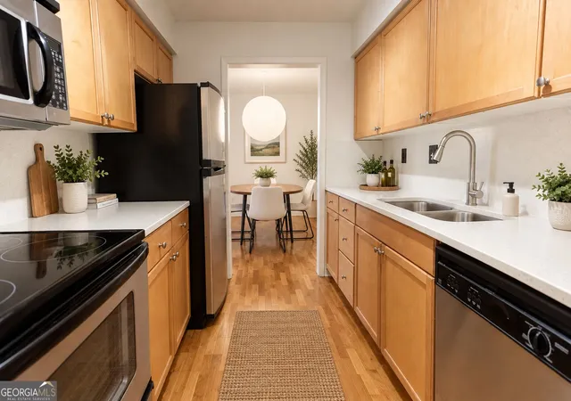Photo 1 of Condo for sale at 1150 Collier Rd NW #11I, Atlanta, GA 30318 | MLS# 10819299 | Listing updated on 2026-09-23