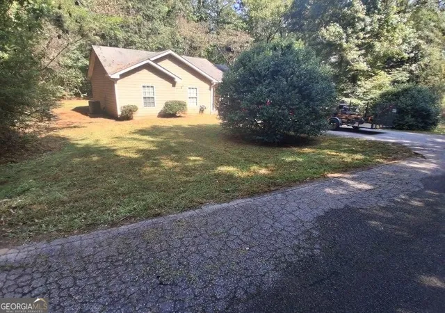 Photo 1 of Single family home for sale at 10125 Flat Shls Rd, Covington, GA 30014 | MLS# 10851630 | Listing updated on 2026-10-07