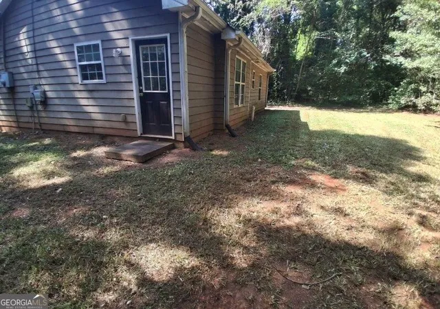 Photo 2 of Single family home for sale at 10125 Flat Shls Rd, Covington, GA 30014 | MLS# 10851630 | Listing updated on 2026-10-07