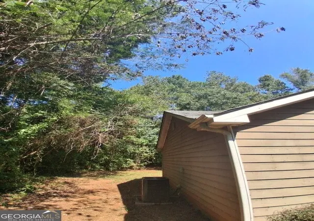 Photo 3 of Single family home for sale at 10125 Flat Shls Rd, Covington, GA 30014 | MLS# 10851630 | Listing updated on 2026-10-07