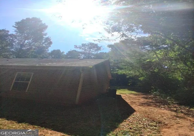 Photo 3 of Single family home for sale at 10125 Flat Shls Rd, Covington, GA 30014 | MLS# 10851630 | Listing updated on 2026-10-07