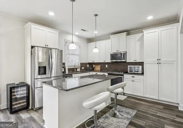 Photo 2 of Single family home for sale at 2118 Garrison Way NW, Atlanta, GA 30318 | MLS# 10839233 | Listing updated on 2026-09-03