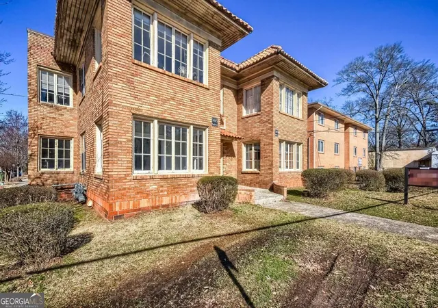 Listing Photo 1 - Condo for sale in building located at 1445 Lucile Ave SW, Atlanta, GA 30310