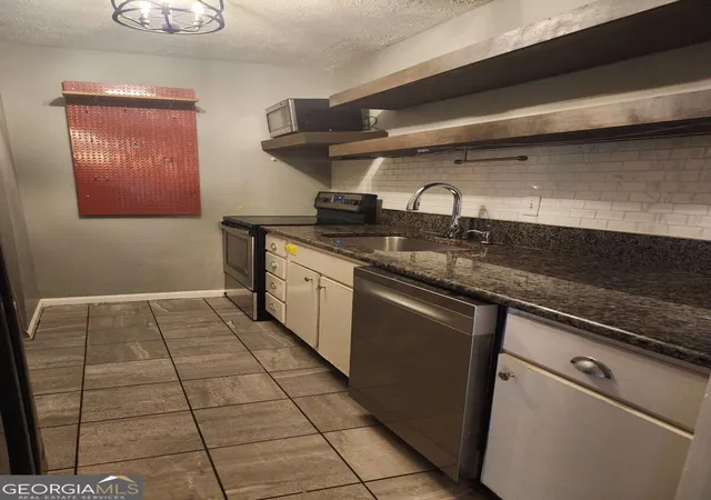 Photo 3 of Condo for sale at 4155 N Gloucester Pl, Chamblee, GA 30341 | MLS# 10844020 | Listing updated on 2026-09-22
