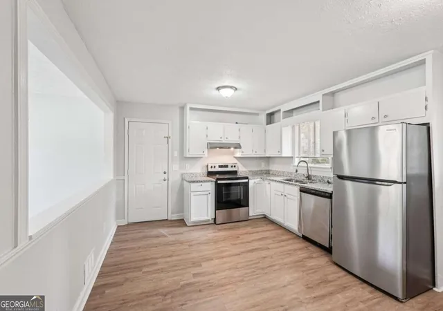 Photo 2 of Single family home for sale at 9157 Homewood Dr, Riverdale, GA 30274 | MLS# 10816129 | Listing updated on 2026-09-11