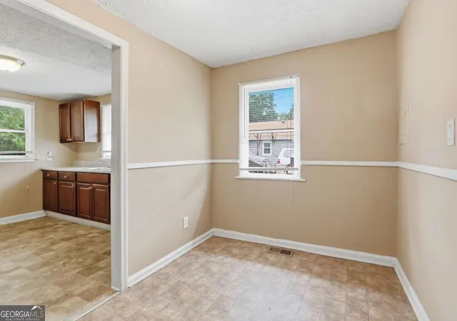 Photo 3 of Single family home for sale at 620 Gibbons Dr, Scottdale, GA 30079 | MLS# 10839615 | Listing updated on 2026-09-17