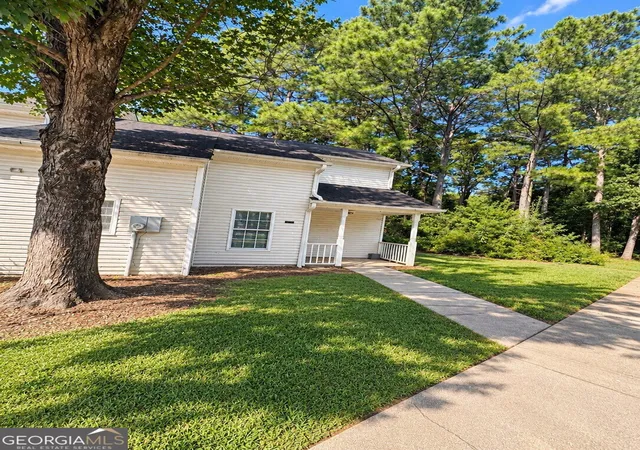 Photo 2 of Townhouse for sale at 5896 Trent Walk Dr, Lithonia, GA 30038 | MLS# 10843272 | Listing updated on 2026-09-24