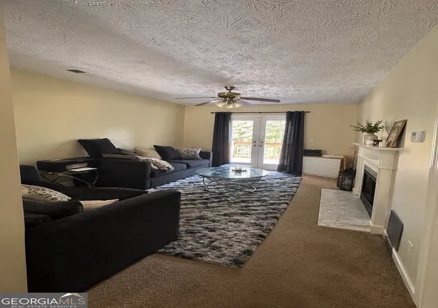 Photo 3 of Townhouse for sale at 5896 Trent Walk Dr, Lithonia, GA 30038 | MLS# 10843272 | Listing updated on 2026-09-24