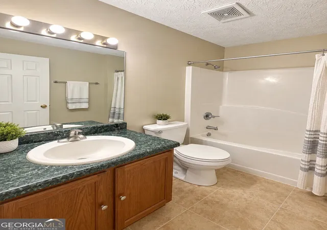 Photo 4 of Townhouse for sale at 5896 Trent Walk Dr, Lithonia, GA 30038 | MLS# 10843272 | Listing updated on 2026-09-24