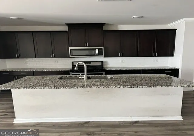 Photo 4 of Townhouse for sale at 1127 Sunny Lake Dr, Lawrenceville, GA 30043 | MLS# 10842173 | Listing updated on 2026-09-09