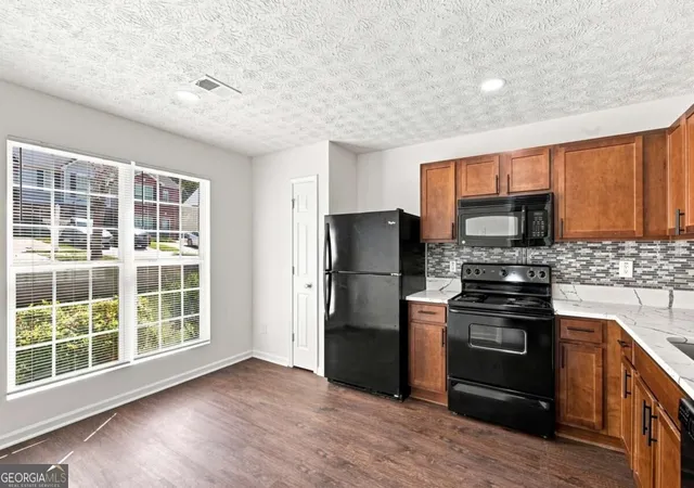 Photo 4 of Townhouse for sale at 8399 Carlington Ln, Jonesboro, GA 30236 | MLS# 10841999 | Listing updated on 2026-10-30