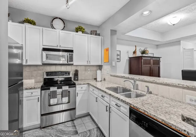 Photo 2 of Condo for sale at 1250 Parkwood Cir SE #2108, Atlanta, GA 30339 | MLS# 10872308 | Listing updated on 2026-10-28