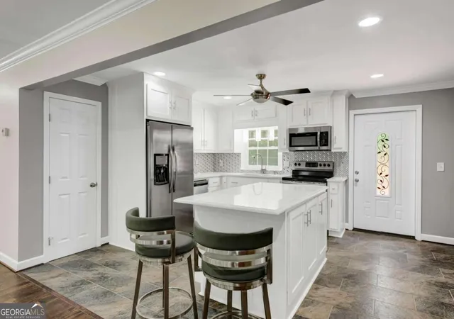 Photo 4 of Single family home for sale at 10142 Sw Puckett St, Covington, GA 30014 | MLS# 10827507 | Listing updated on 2026-09-04