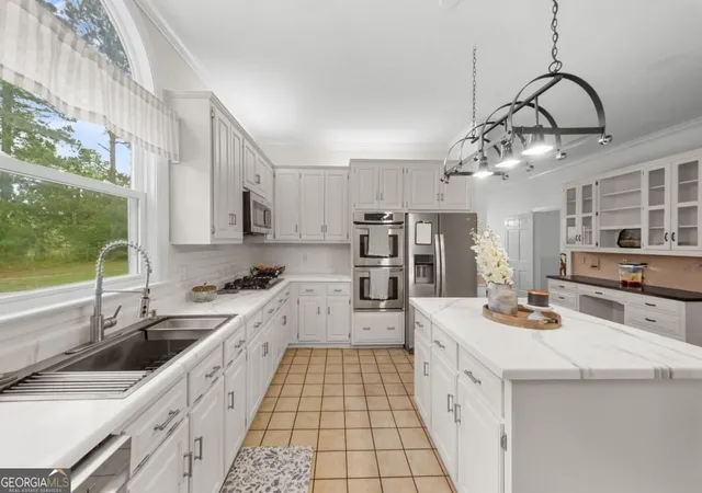 Photo 3 of Single family home for sale at 313 Miller St, Statesboro, GA 30458 | MLS# 10842979 | Listing updated on 2026-09-10