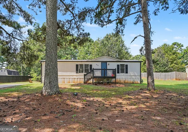 Photo 1 of Single family home for sale at 915 Steele Dr, Hampton, GA 30228 | MLS# 10840372 | Listing updated on 2026-09-18