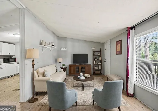 Photo 2 of Single family home for sale at 915 Steele Dr, Hampton, GA 30228 | MLS# 10840372 | Listing updated on 2026-09-18