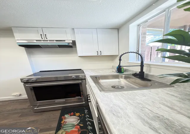 Photo 1 of Townhouse for sale at 722 Garden View Dr, Stone Mountain, GA 30083 | MLS# 10878718 | Listing updated on 2026-10-27