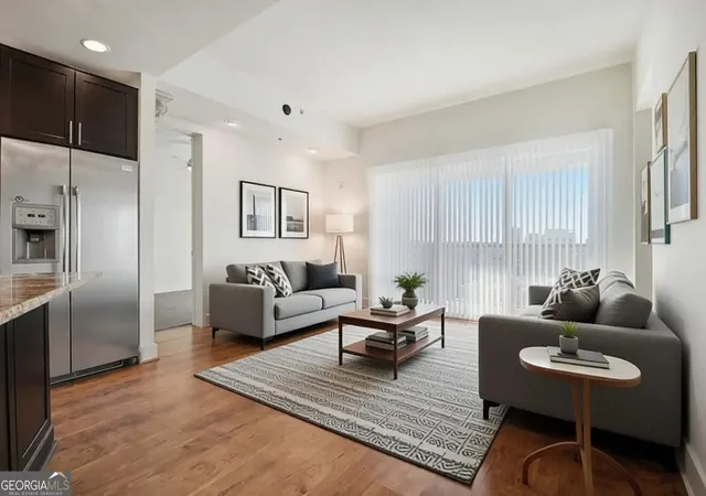 Listing Photo 1 - Condo for sale in building located at 4561 Olde Perimeter Wy, Atlanta, GA 30346 - Unit #704