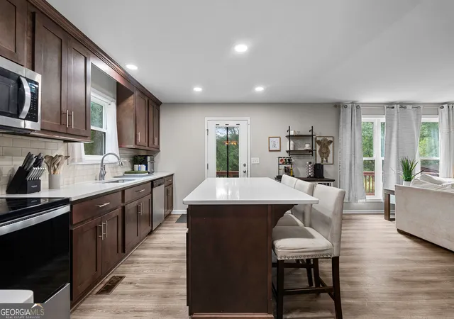 Photo 4 of Single family home for sale at 303 Gamble Dr, Carrollton, GA 30116 | MLS# 10825405 | Listing updated on 2026-09-02