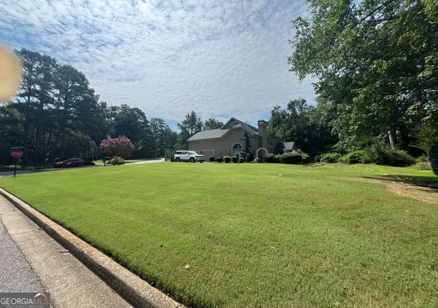 Photo 3 of Single family home for sale at 12080 Magnolia Crescent Dr, Roswell, GA 30075 | MLS# 10827167 | Listing updated on 2026-10-08