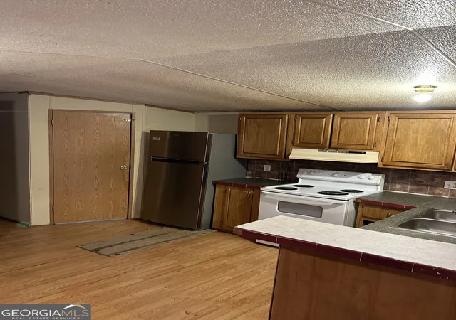 Photo 2 of Manufactured home for sale at 54 Skyland Dr W, Locust Grove, GA 30248 | MLS# 10846638 | Listing updated on 2026-09-30