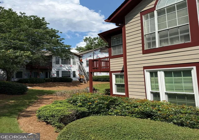 Photo 3 of Condo for sale at 1018 Sandy Ln Dr Ne, Alpharetta, GA 30022 | MLS# 10845775 | Listing updated on 2026-09-29
