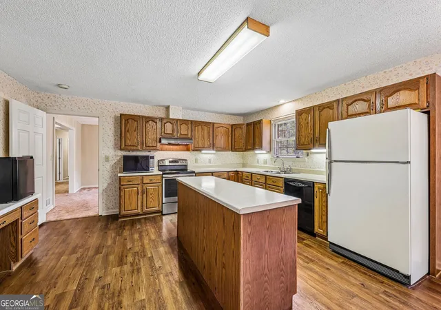 Photo 4 of Single family home for sale at 8791 Pleasant Hl Rd, Lithonia, GA 30058 | MLS# 10848198 | Listing updated on 2026-09-17