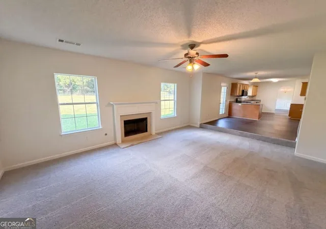 Photo 2 of Single family home for sale at 7425 Bodnant Dr, Fairburn, GA 30213 | MLS# 10851616 | Listing updated on 2026-10-07