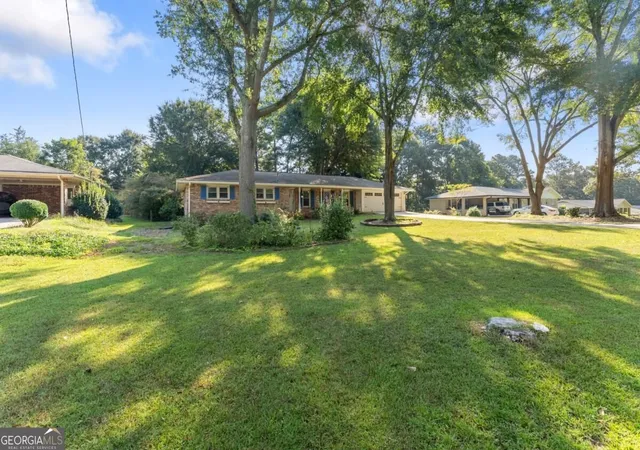 Photo 3 of Sale Pending at 1212 Stephens St SW, Lilburn, GA 30047 | MLS# 10840013 | Listing updated on 2026-09-22