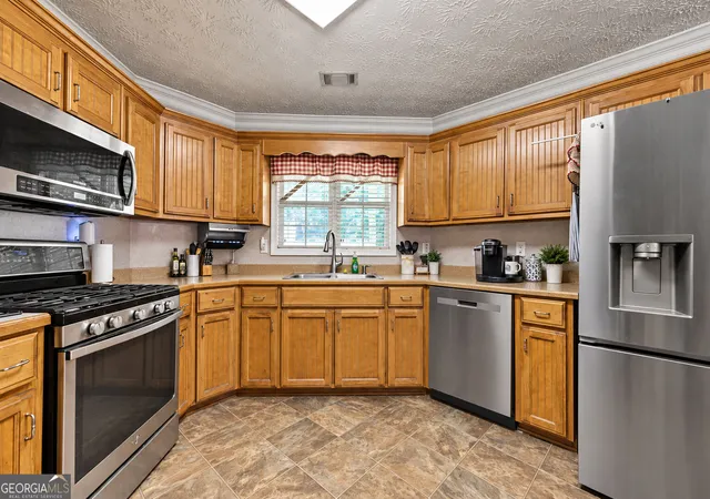 Photo 2 of Single family home for sale at 105 Stewart Holw Ln, Covington, GA 30016 | MLS# 10847956 | Listing updated on 2026-09-24