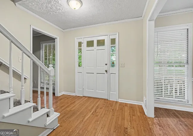 Photo 2 of Single family home for sale at 1465 Lake Lucerne Rd Sw, Lilburn, GA 30047 | MLS# 10836618 | Listing updated on 2026-09-18