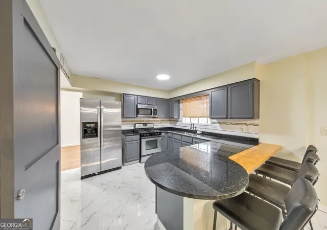 Photo 2 of Single family home for sale at 4996 Ter Green Tr, Stone Mountain, GA 30088 | MLS# 10840506 | Listing updated on 2026-09-17