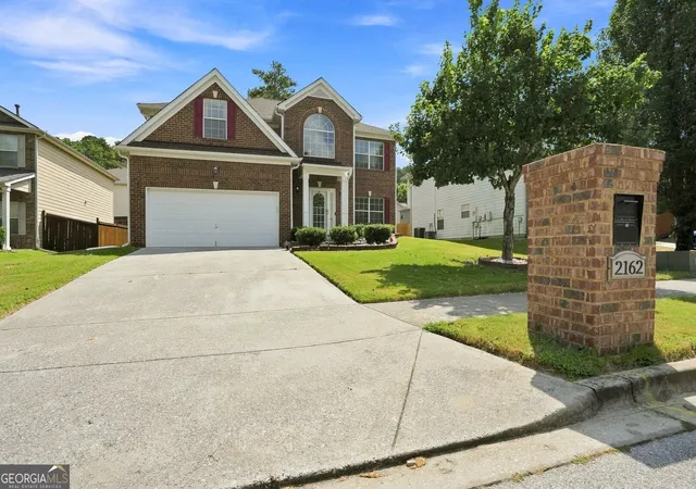 Photo 2 of Single family home for sale at 2162 Poplar Fls Ave, Lithonia, GA 30058 | MLS# 10837569 | Listing updated on 2026-09-15