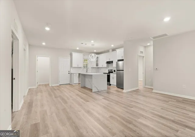 Photo 2 of Single family home for sale at 6824 Church St, Lithonia, GA 30058 | MLS# 10841120 | Listing updated on 2026-09-25