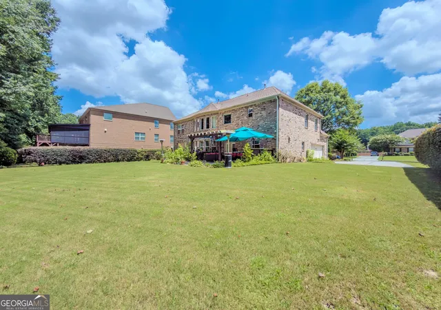 Photo 2 of Single family home for sale at 40 Village Green Ct Sw, Lilburn, GA 30047 | MLS# 10810394 | Listing updated on 2026-09-16