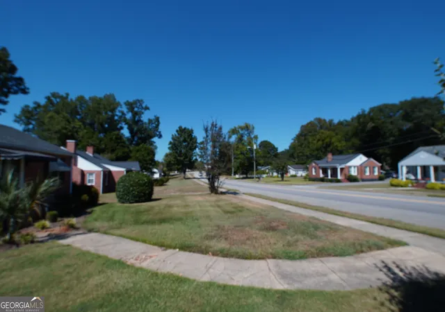 Photo 2 of Single family home for sale at 401 N Harris St, Sandersville, GA 31082 | MLS# 10849299 | Listing updated on 2026-09-23