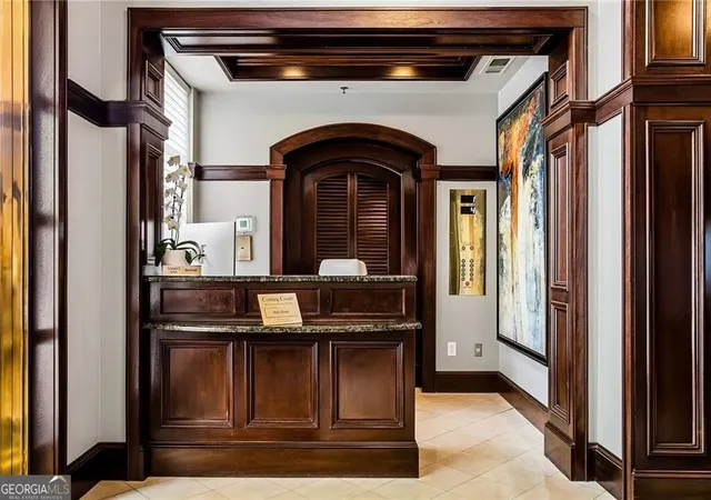 Listing Photo 1 - Condo for sale in building located at 77 Peachtree Pl Ne, Atlanta, GA 30309 - Unit #201