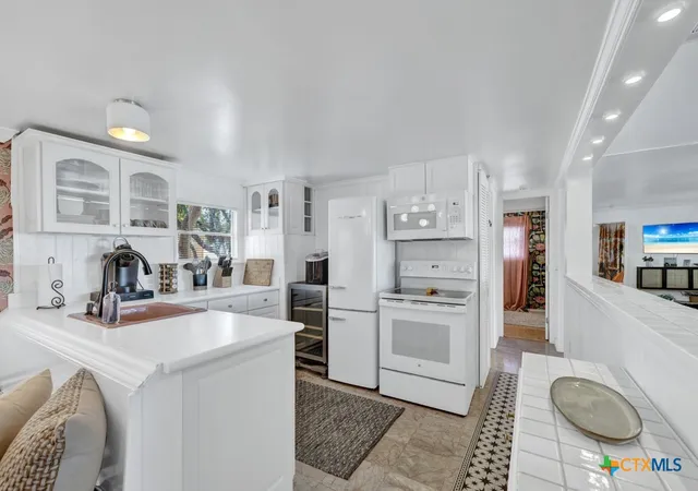 Photo 4 of Single family home for sale at 901 Glenn Dr, Canyon Lake, TX 78133 | MLS# 604787 | Listing updated on 2026-09-02