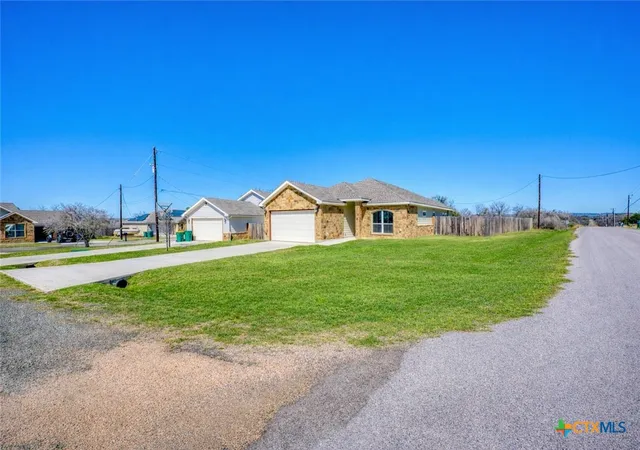 Photo 1 of Single family home for sale at 1516 Stonecrest Dr, Granite Shoals, TX 78654 | MLS# 605465 | Listing updated on 2026-08-24