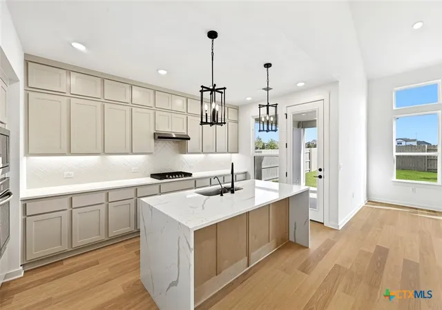 Photo 4 of Single family home for sale at 9612 Golden Lion Dr, Austin, TX 78744 | MLS# 605634 | Listing updated on 2026-09-09