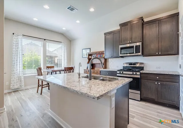 Photo 3 of Single family home for sale at 712 Coyote Crk Way, Kyle, TX 78640 | MLS# 608857 | Listing updated on 2026-09-17
