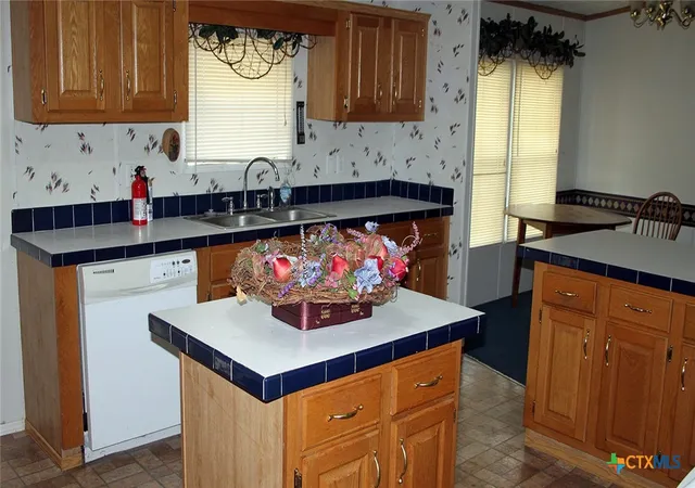 Photo 2 of Manufactured home for sale at 12000 Mustang Mesa Dr, Buda, TX 78610 | MLS# 614389 | Listing updated on 2026-08-04