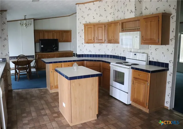Photo 3 of Manufactured home for sale at 12000 Mustang Mesa Dr, Buda, TX 78610 | MLS# 614389 | Listing updated on 2026-08-04