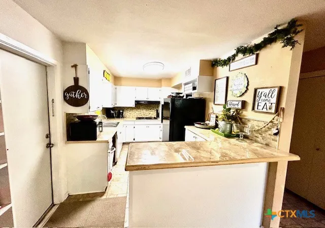 Photo 3 of Single family home for sale at 206 Bohman St, Cuero, TX 77954 | MLS# 620779 | Listing updated on 2026-09-04
