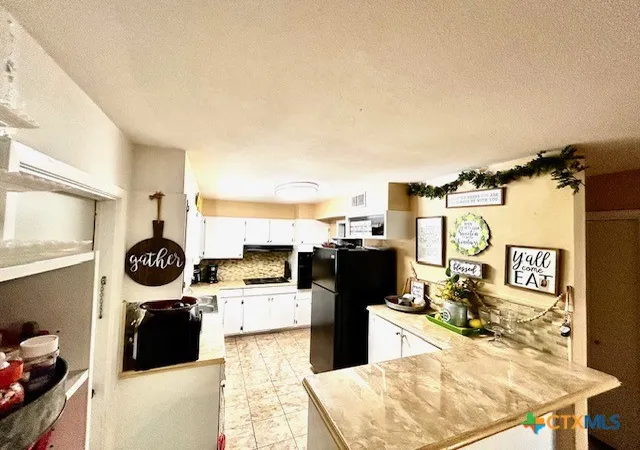 Photo 4 of Single family home for sale at 206 Bohman St, Cuero, TX 77954 | MLS# 620779 | Listing updated on 2026-09-04